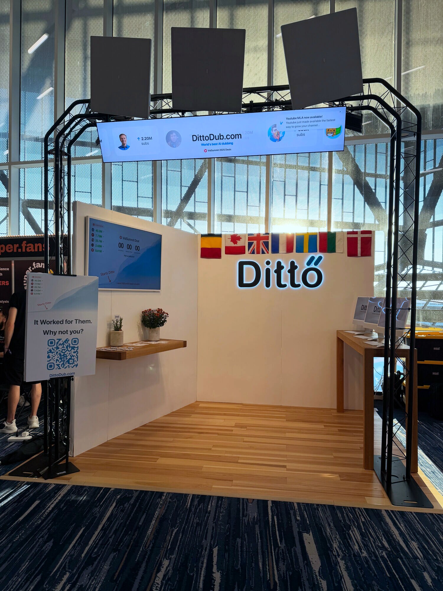 Portrait photo of the DittoDub booth at VidSummit